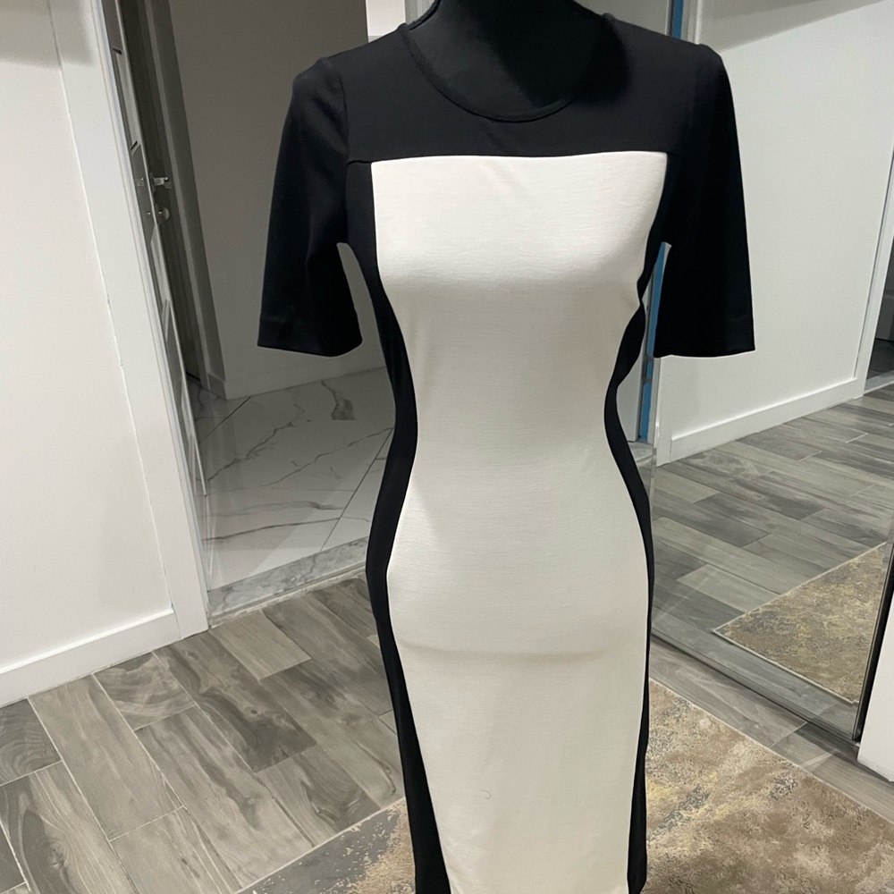 Black and white dress, ideal for work or dinner out.